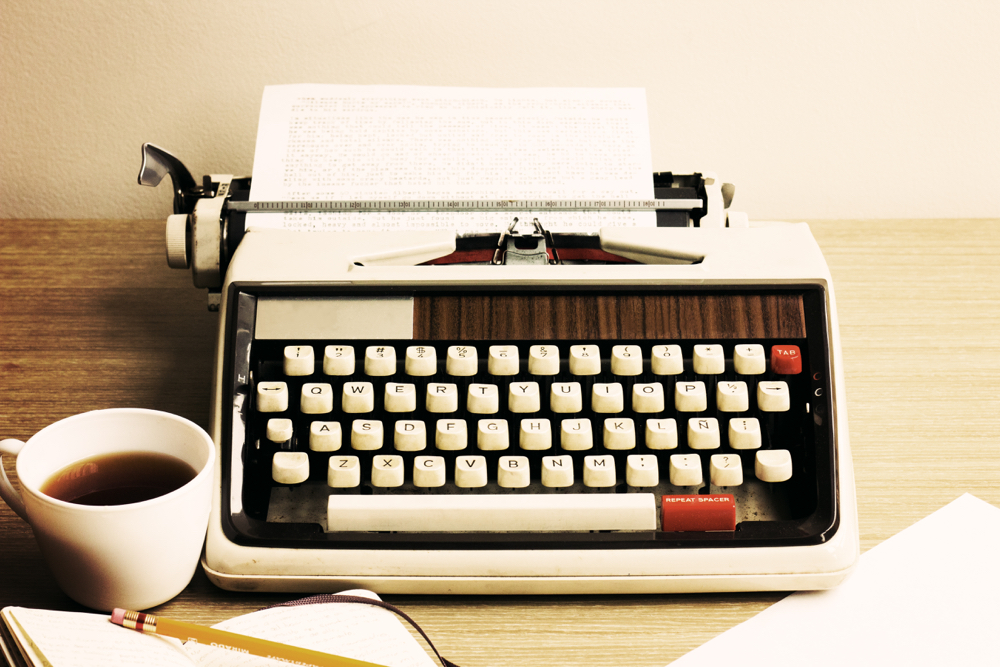 vintage-typewriter-and-coffee-cup.jpg